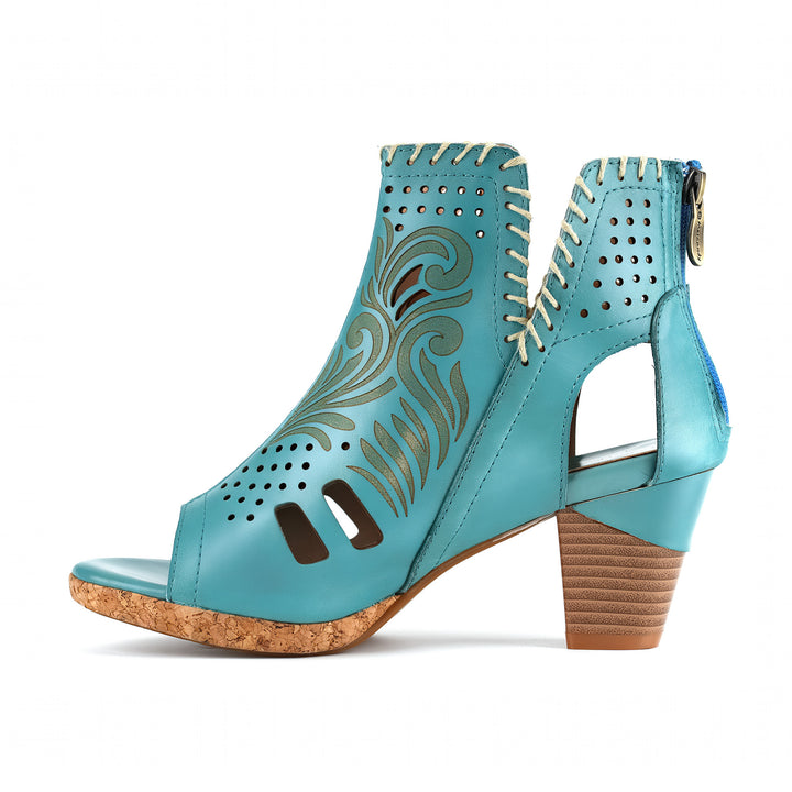 Türkisfarbene Sandalen mit offenem Zehenbereich und Ausschnitten