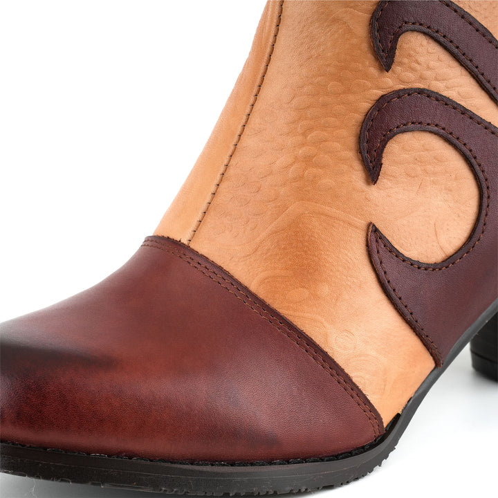 Stivaletti vintage in pelle con ricciolo bicolore