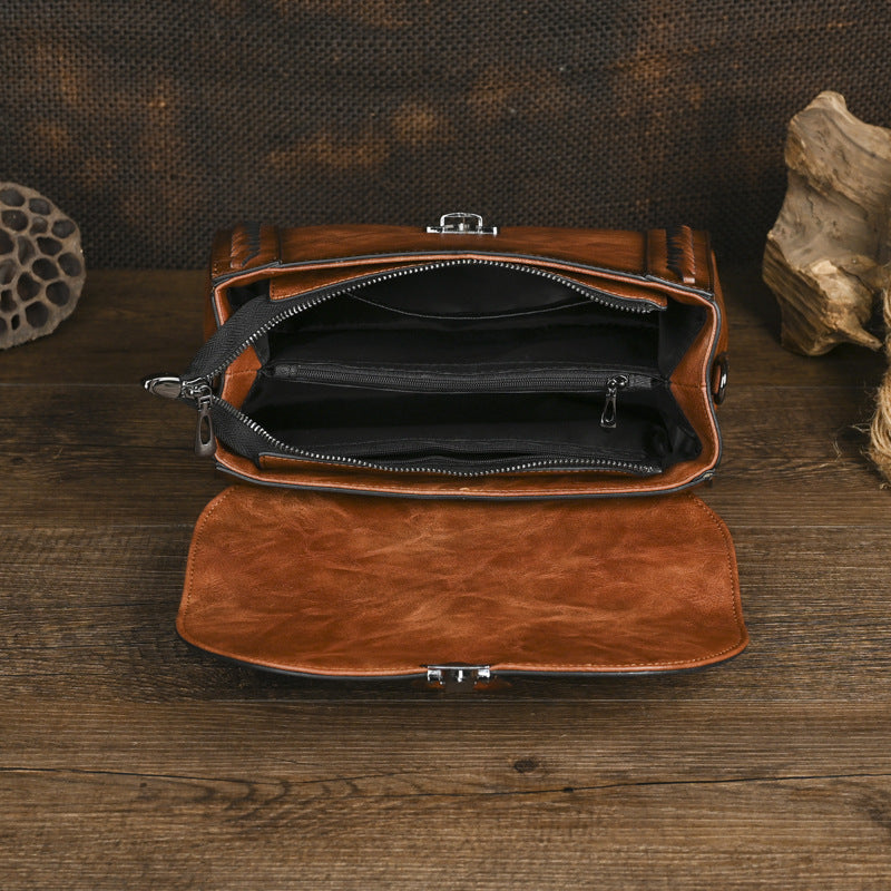 Borsa a tracolla con manico superiore vintage in rilievo