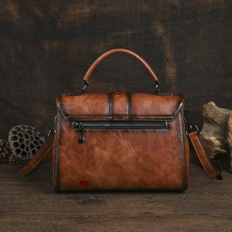 Borsa a tracolla con manico superiore vintage in rilievo