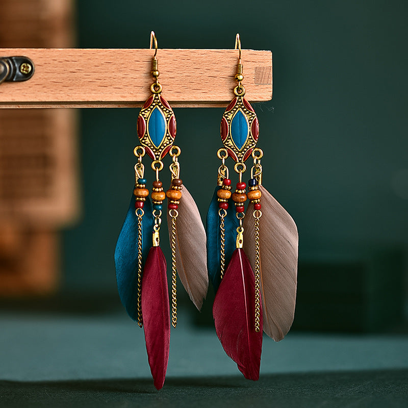 Pendientes de plumas bohemios con flecos retro