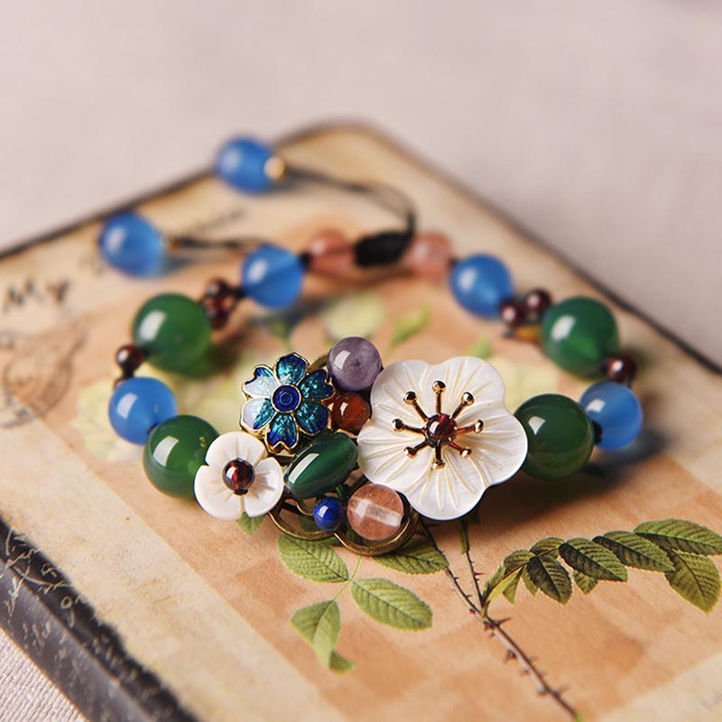 Pulsera de flores turquesas tejidas