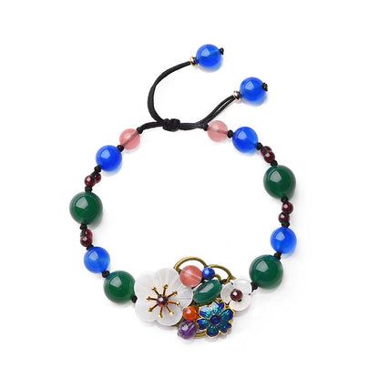 Pulsera de flores turquesas tejidas